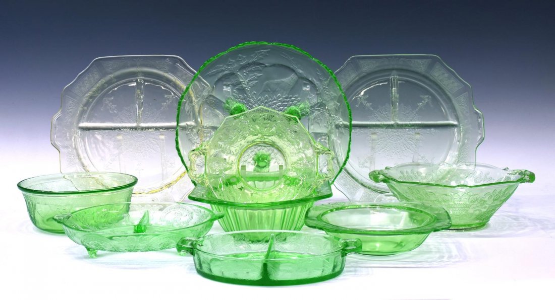 (10) GROUP OF PATTERNED GREEN DEPRESSION GLASS: (lot of 10) Green vaseline depression glass serving ware, various patterns and makers, including: (1) Adam pattern rectangular rim dish, 9.75"w; (1) Fenton glass Stag and Holly pattern ice cream bowl,