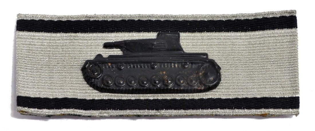 GERMAN WWII TANK DESTRUCTION BADGE: German WWII Tank Destruction Badge, Silver, awarded to a soldier who destroyed a tank using a hand held weapon, 1.25"h, 3.5"l *Provenance: Dispersal of the Blanco County WW2 Museum collection, Blanco,