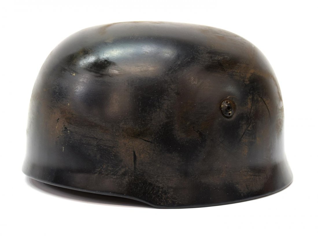 GERMAN WWII LUFTWAFFE PARATROOPER HELMET: German WWII Luftwaffe paratrooper helmet, M1938, two worn illegible stamps at inside leather liner, no remaining decals, 5.5"h, 10"w, 9"d, 2.75lbs *Provenance: Dispersal of the Blanco County WW2 Museu