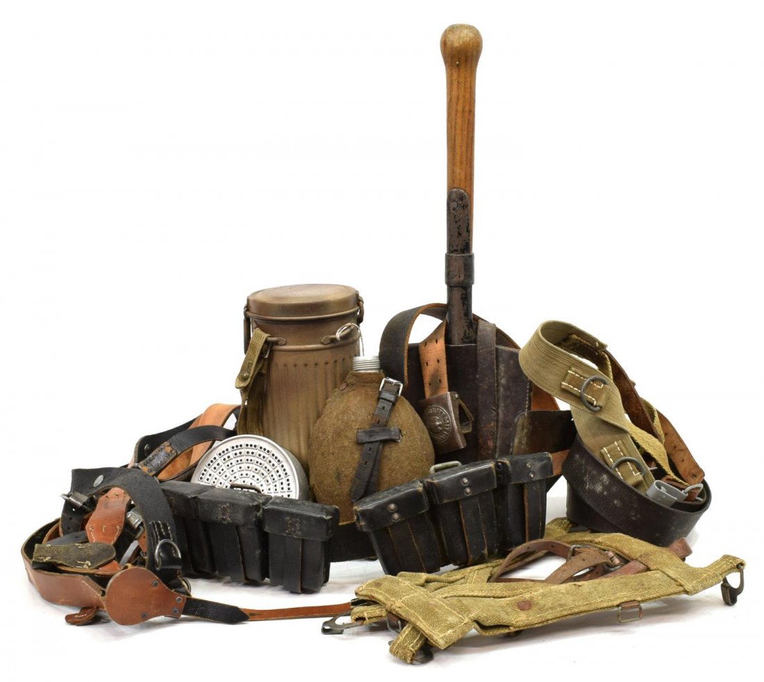 (LOT) GERMAN MILITARY ITEMS, AMMO BELT, STRAPS ETC: (lot) German WWII related items including A frame for back pack, 'Y' straps, water flask (canteen) lacking screw on lid and cup; belt with ammunition pouches, canister only for gas mask, trench shovel