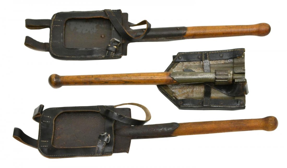 (3) GERMAN WWII ENTRENCHING SHOVELS & COVERS: (lot of 3) German WWII entrenching tools, wood handle shovels, one folding, all with leather covers and belt loops, one marked " A. Waodhausen, Koln 1942", rust on metal shovels, some rust, largest: 2