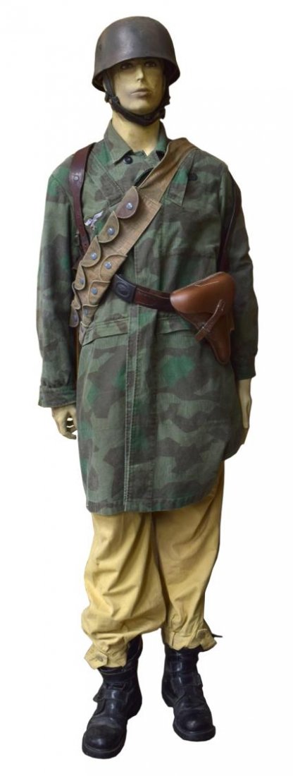 GERMAN WWII SOLDIER DRESSED MUSEUM MANNEQUIN: German WWII dressed mannequin representing Africa Corps paratrooper wearing camouflage tunic, reproduction uniform, approx. 73" tall *Provenance: Dispersal of the Blanco County WW2 Museum collection, 