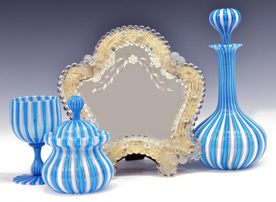 (4) GROUP OF VENETIAN ART GLASS ITEMS, 20TH C.: (lot of 4) Group of Venetian art glass items, 20th c., comprising: (1) table top mirror, the scrolling glass frame with floral accents around the etched shaped plate, mounted to wooden stand, 10.75"h,