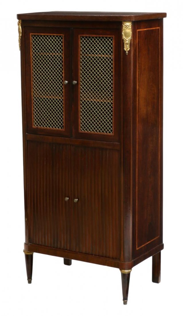 ITALIAN MAHOGANY MUSIC CABINET: Italian mahogany music cabinet, 20th c., the top with string inlay over two metal grill faced doors and two lower doors, all rising on tapered turned legs, 50.5"h, 23.5"w, 14.5"d Start Price: $200.00