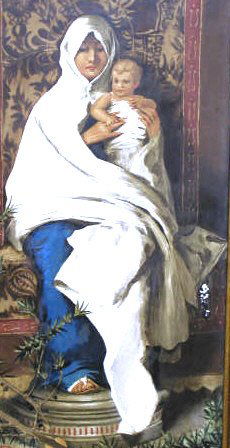 ANTIQUE RELIGIOUS PORCELAIN PLAQUE SIGNED: An Italian antique religious porcelain plaque depicting Mary with the Christ child seated on her lap. The plaque is signed on the back "Aureilo Innocenti, Florence". Slight paint loss below right cent