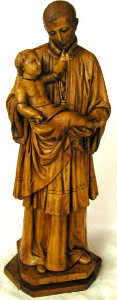 ANTIQUE RELIGIOUS STATUE WITH CHRIST CHILD: An antique Spain, gesso over wood, religious statue. Both figures have glass eyes. Some scratches, glue at joints, cracks and two fingers on childs hand missing. About 25"x10"x7" and 10.25lbs.