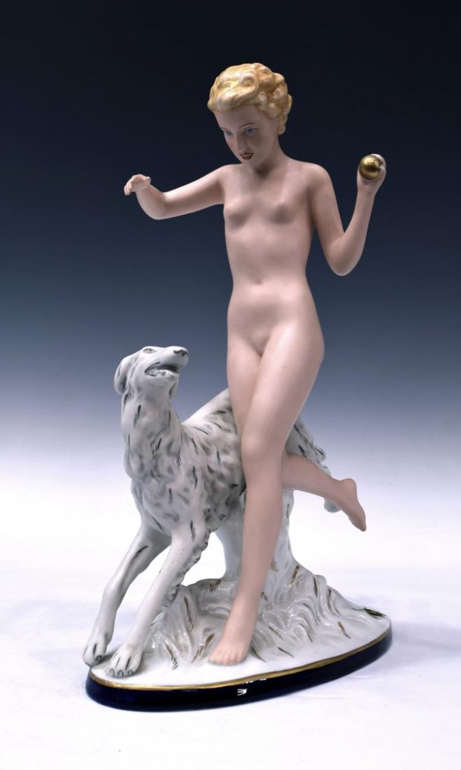 ROYAL DUX ART DECO STYLE NUDE BEAUTY WITH DOG: (lot of 2) Royal Dux porcelain figures: (1) Art deco style nude with Borzoi, retaining tag, marked underfoot, 14.75"h, 10"l, 2.75lbs Start Price: $60.00