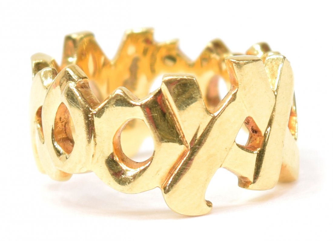 LADIES TIFFANY & CO PALOMA PICASSO 18KT "X" RING: Ladies Tiffany & Co Paloma Picasso 18kt yellow gold "X" ring, marked and signed inside band, size 4, 7.5 grams Start Price: $450.00