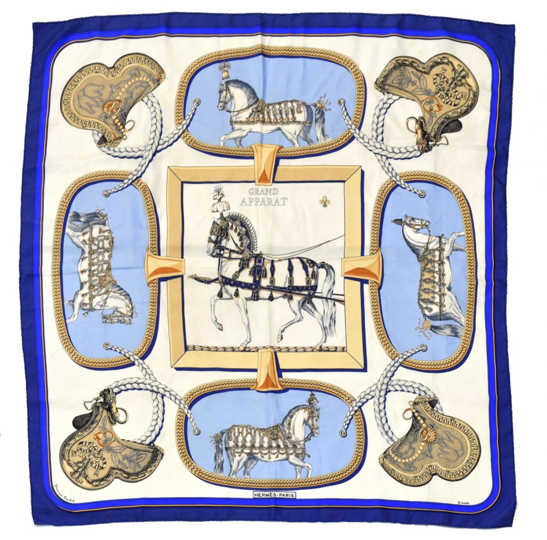 HERMES 'GRAND APPARAT' SILK TWILL SQUARE SCARF: Hermes "Grand Apparat" silk twill square scarf, having a cobalt blue border around a pattern of show horses, originally designed by Jacques Eudel, signature lower corner, hand rolled edge, retaining s