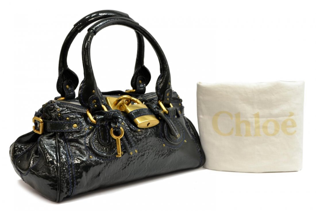 CHLOE 'PADDINGTON MM' PATENT LEATHER HANDBAG: Chloe "Paddington" in dark green patent leather with brushed gold tone and silver tone hardware, two exterior slot pockets, top unzips to black cloth lined interior, with slot and zipped pockets, on s