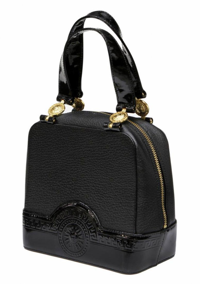 VINTAGE GIANNI VERSACE BLACK LEATHER HANDBAG: Vintage Versace handbag in black grained leather with black patent leather handles, gold tone hardware, printed liner, single zip pocket, dust bag, overall wear, scuffs, bag: approx 7.5"h, 8"w, 4.5"d,