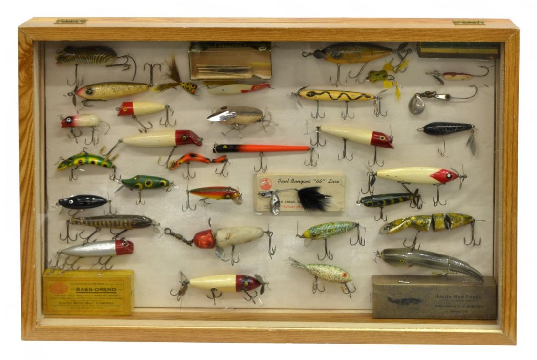 (32) VINTAGE FISHING LURES IN WOOD DISPLAY BOX: (lot of 32) Vintage fishing lures including jointed, glass eyes, wood, 1940's Bass Oreno with box, three others with original boxes, spinners, Pfluger Globe, Heddon Lazy Crawler, all housed in wood di