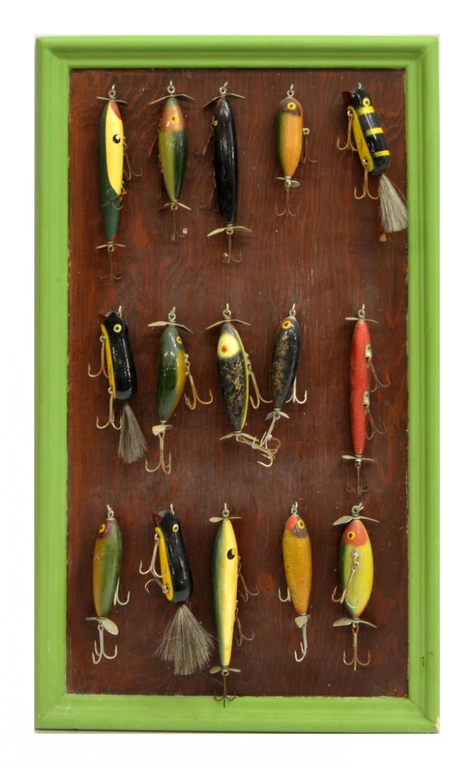 (15) VINTAGE FISHING LURES & DISPLAY BOARD: (lot of 15) Open display board with fifteen vintage fishing lures, overall: 20.75"h, 12.25"w, 2.75lbs Start Price: $80.00