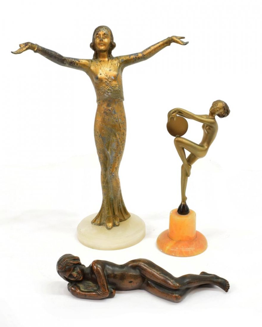 (3) GROUP OF FIGURAL NUDE FEMALE METAL SCULPTURES: (lot of 3) Group of figural sculptures, comprising: (1) patinated reclining nude woman, signed E.W. Keyser (Ernest Wise Keyser, Florida/New York, 1876-1959), approx. 8"l; (1) gilt metal deco figure wi