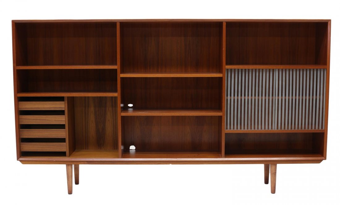 DANISH MID-CENTURY MODERN SIDEBOARD BOOKCASE: Danish mid-century modern open front sideboard bookcase, 1950's, with shelves, drawers and two sliding glass doors, rising on turned tapered legs, 44.5"h, 79"w, 12"d Start Price: $150.00
