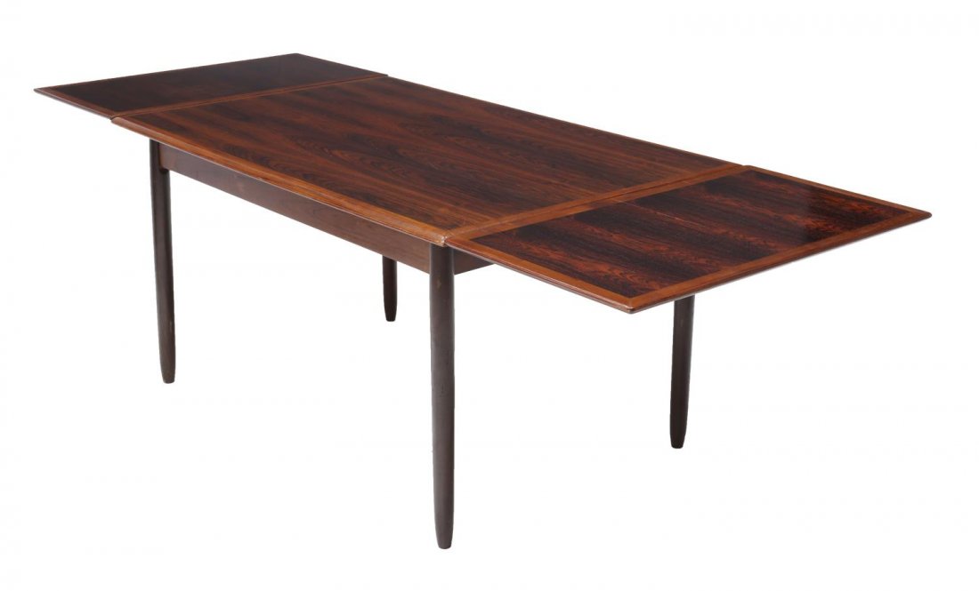 DANISH MID CENTURY MODERN ROSEWOOD DRAWLEAF TABLE: Danish mid-century modern rosewood draw leaf table, 1950s/1960s, the rectangular top concealing two leaves, rising on tapered legs, table: 28.5"h, 53"w, 35"d, each leaf: 18"w Start Price: $250.00