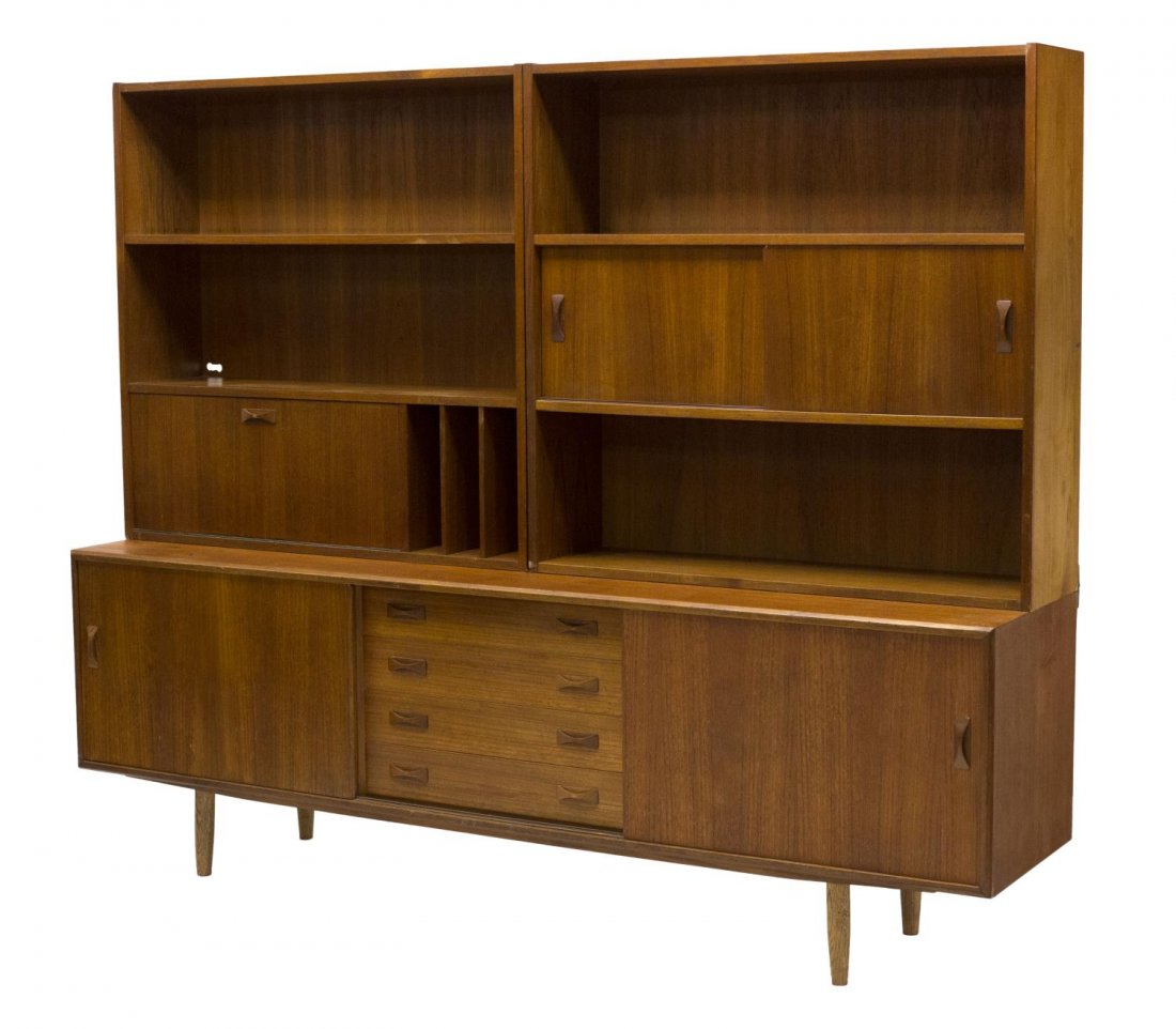 DANISH MID-CENTURY MODERN TEAK BOOKCASE: Danish mid-century modern teakwood bookcase, 1950's, bearing the tag of Clausen & Son, the upper part with open shelves, sliding door and drop front writing area, the lower part with four central draw