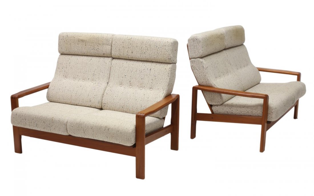 (2) DANISH MODERN SETTEES, BURCHARDT-NIELSEN: (lot of 2) Danish modern teakwood framed settees, c. 1970, retaining the tag of S. Burchardt-Nielsen MÃ¸belfabrik, a slat back with beige tweed removable back and seat buttoned cushions, the arms wi