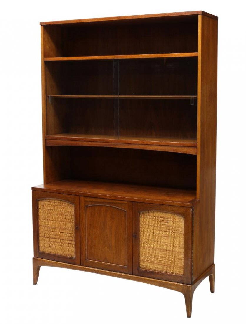 AMERICAN MID-CENTURY MODERN DISPLAY CABINET: American mid-century display cabinet, a hutch, two open shelves above a shelf with sliding glass doors, a central work space over two cane front doors, rising on tapered supports, 69"h, 44.75"w, 17.5"