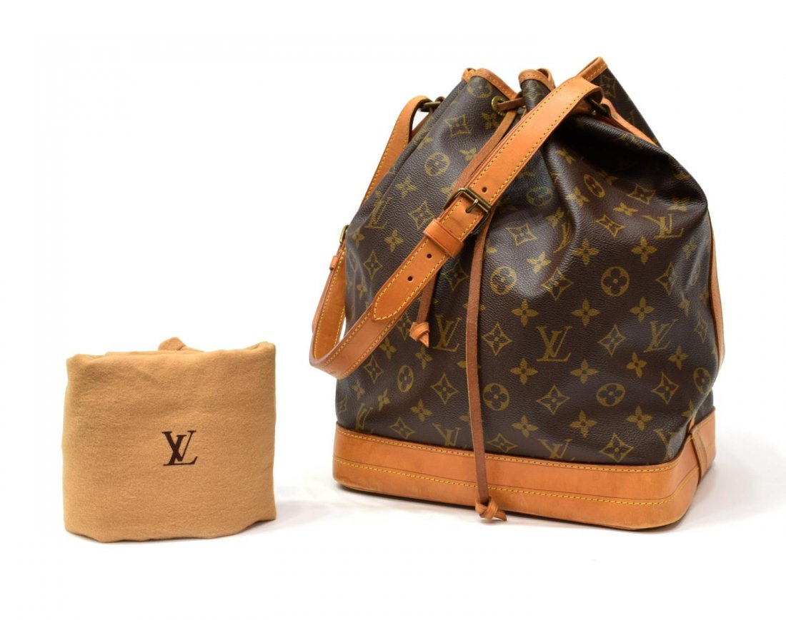 LOUIS VUITTON 'NOE GM' MONOGRAM CANVAS BUCKET BAG: Louis Vuitton "Noe GM" drawstring shoulder bag in monogram canvas, leather trim, gold tone hardware, the drawstring top opening to brown canvas lined interior, accompanied by dust bag, patination, spo