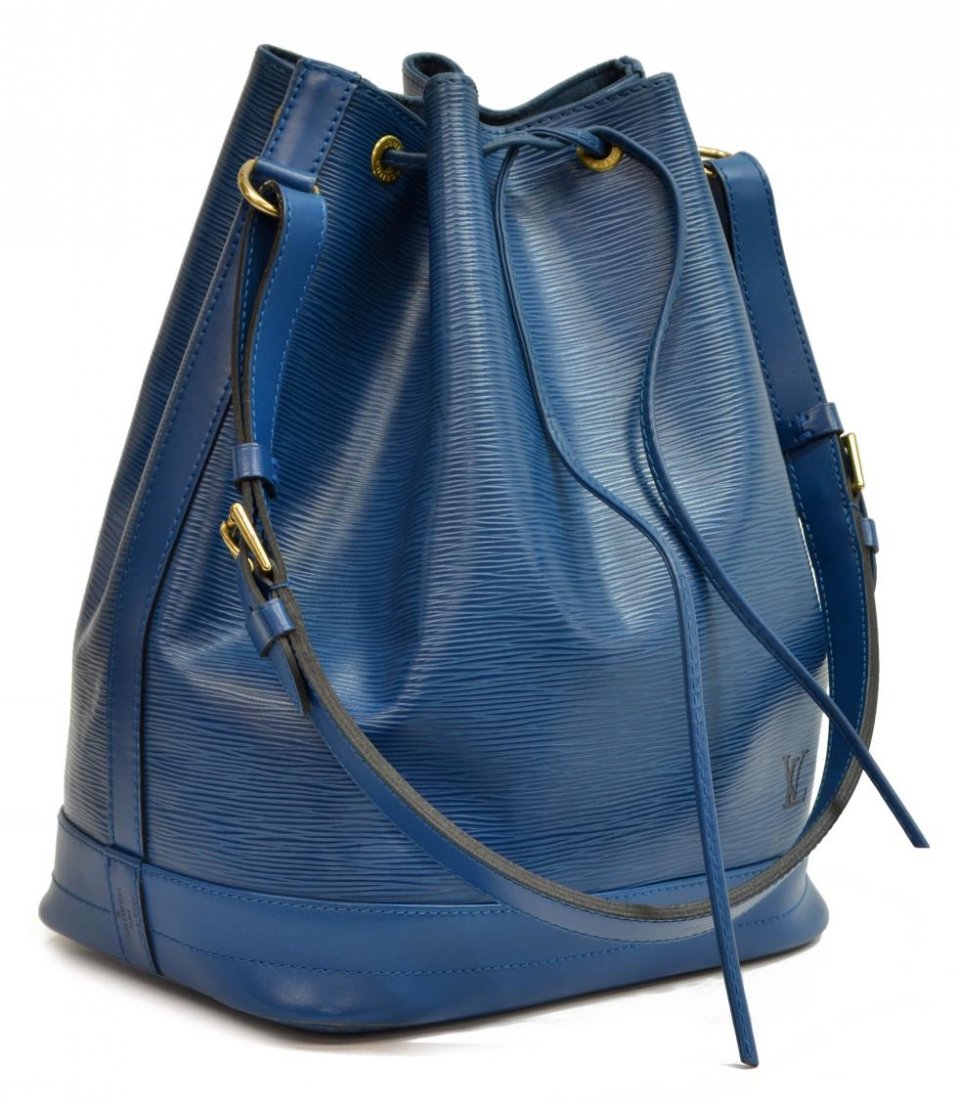 LOUIS VUITTON 'NOE GM' BLUE EPI LEATHER BUCKET BAG: Louis Vuitton "Noe GM" drawstring bucket bag in blue Epi leather, adjustable shoulder strap, gold tone hardware, drawstring top opens to blue interior, bag: approx 13.5"h, 11"w, 8"d, 1.75lbs Start Pri