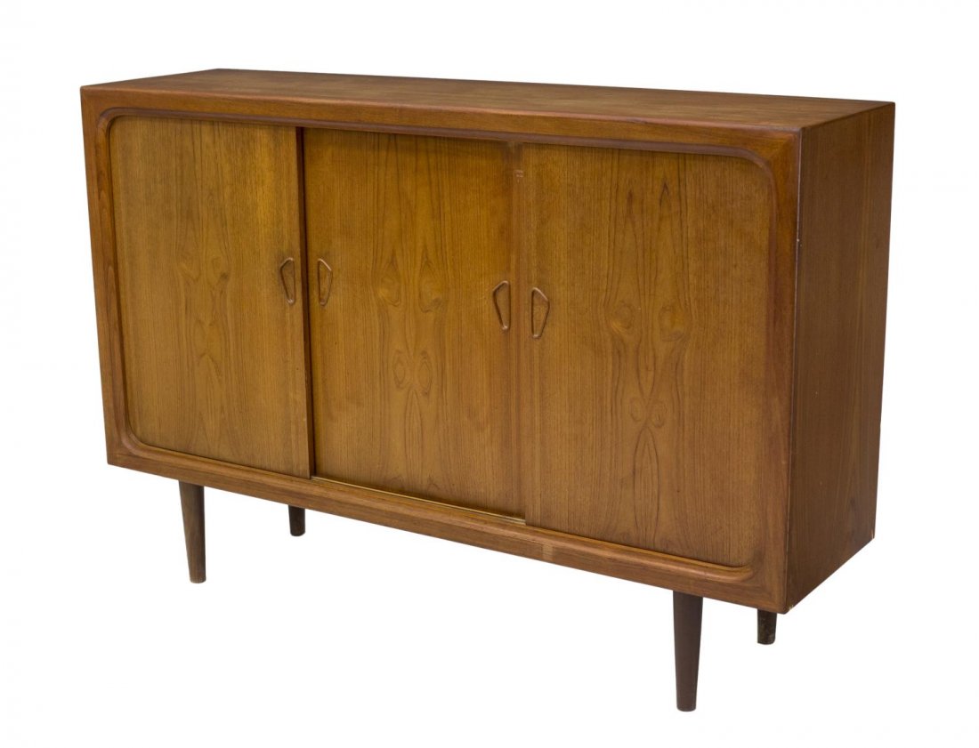 DANISH MID-CENTURY MODERN TEAK SIDEBOARD: Danish mid-century modern sideboard, 1950's, having three sliding doors opening to shelves and drawers, rising on tapered turned legs, 41.25"h, 61"w, 16.5"d Start Price: $250.00