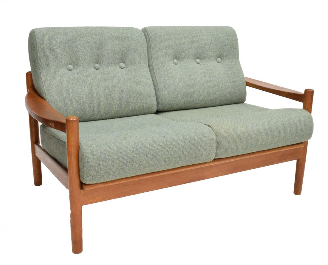 DANISH MID-CENTURY MODERN TEAKWOOD OPEN ARM SOFA: Danish mid-century modern teakwood open arm two-seater love seat sofa, 1960s, having removable back rests and seat cushions over the teakwood frame, with flat armrests, rising on cylindrical legs, 30"