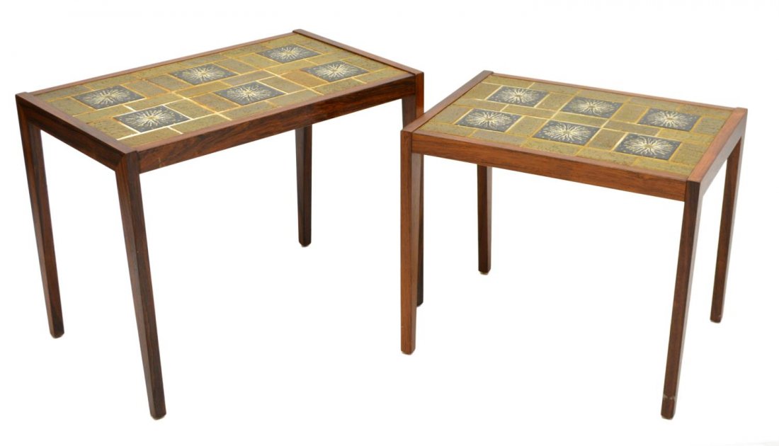 (2) DANISH MID-CENTURY ROSEWOOD NESTING TABLES: (lot of 2) Danish mid-century modern rosewood nesting tables, c. 1960's, both having a rectangular top with inset olive green and black tiles, white floral pattern, raised on square legs, tallest: 19.