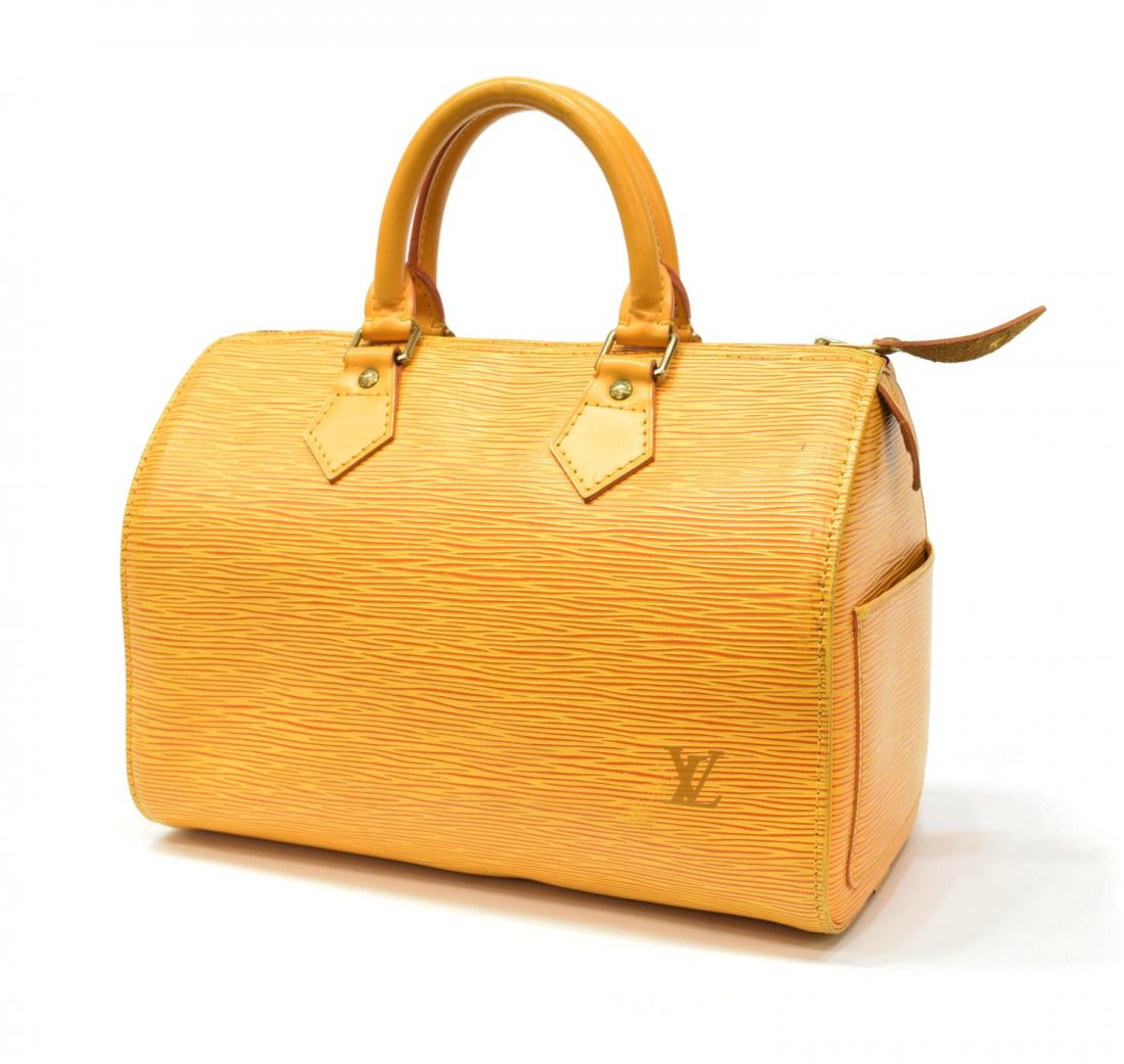 LOUIS VUITTON 'SPEEDY 25' EPI LEATHER HANDBAG: Louis Vuitton "Speedy 25" handbag in yellow Epi leather, exterior slot pocket to side, interior with with hanging purple fabric pocket, leather handles, single zipper closure, retaining lock and key, 