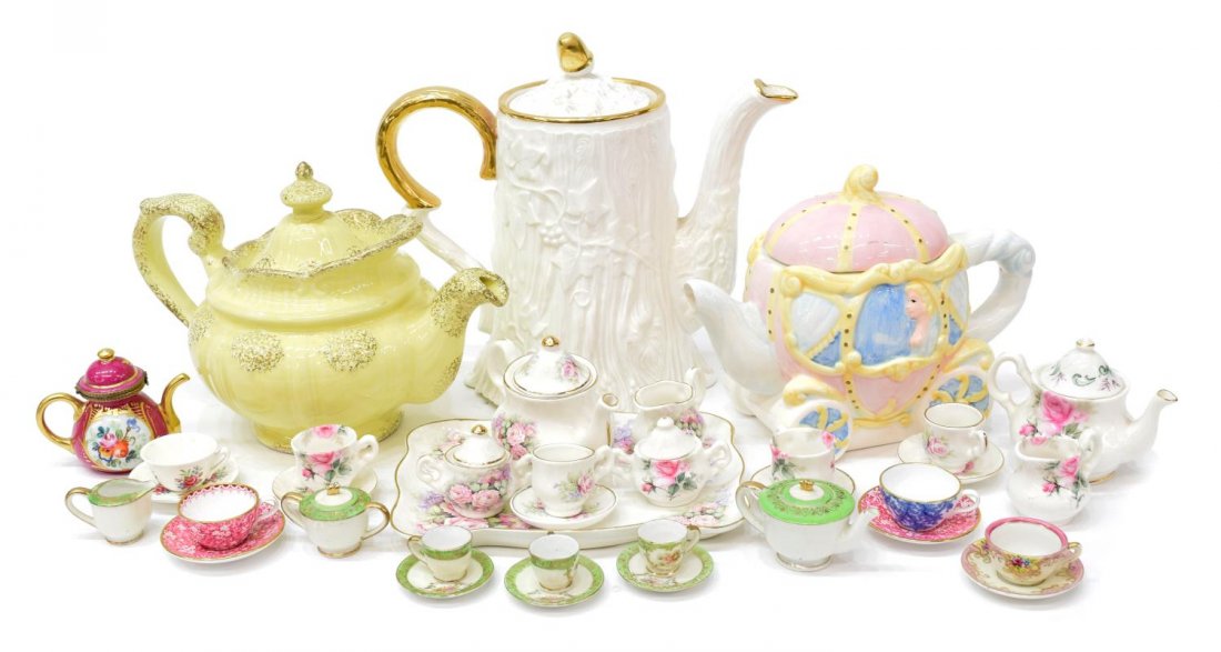 GROUP MINIATURE PORCELAIN TEASETS & (3) TEAPOTS: (lot) Collection of miniature porcelain tea sets and associated items, together with (3) teapots, makers include Staffordshire, Occupied Japan, Spode and (1) Limoges box in the form of a teapot, the l