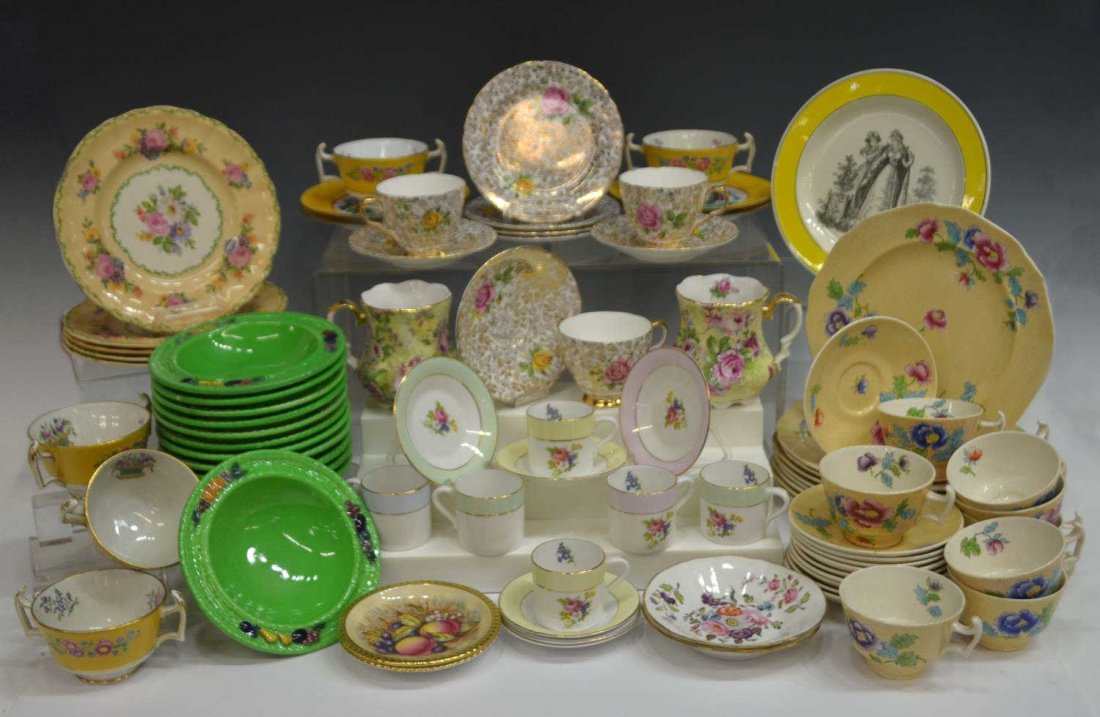 ENGLISH PARCEL GILT PORCELAIN DINNERWARE: (lot) Collection of English china partial dinnerware items, highlights include: Carlton Ware England "fruit basket" bowls; Spode Copeland England double handled tea cups; Cauldon floral decorated tea