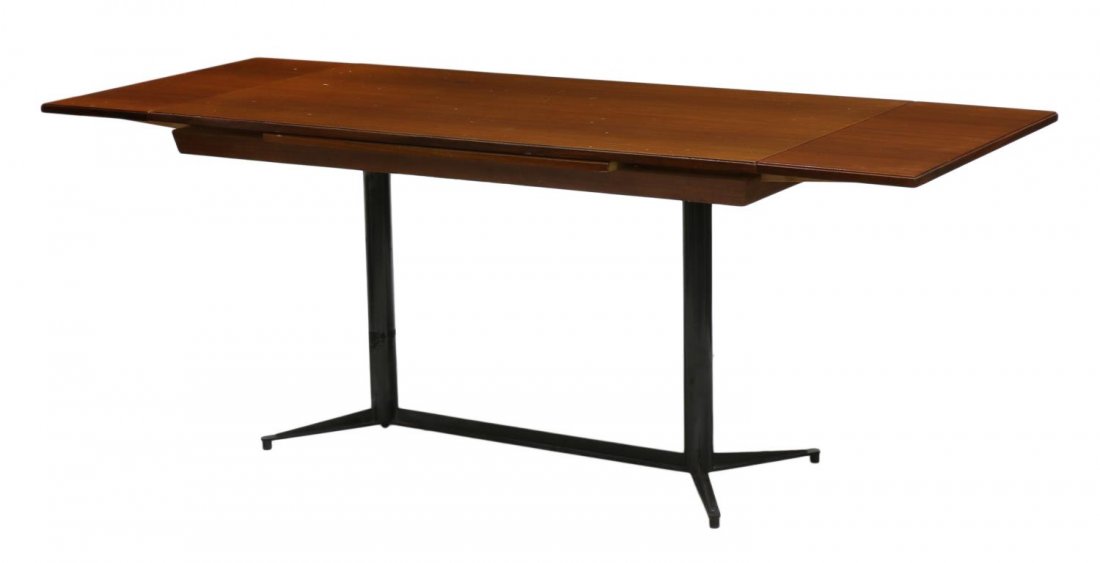 ITALIAN MID-CENTURY MODERN DRAW LEAF DINING TABLE: Italian mid-century modern draw leaf table, c. 1960, raised on a black steel base, 29.5"h, 55"l, 29.5"w extended: 78.75"l Start Price: $100.00