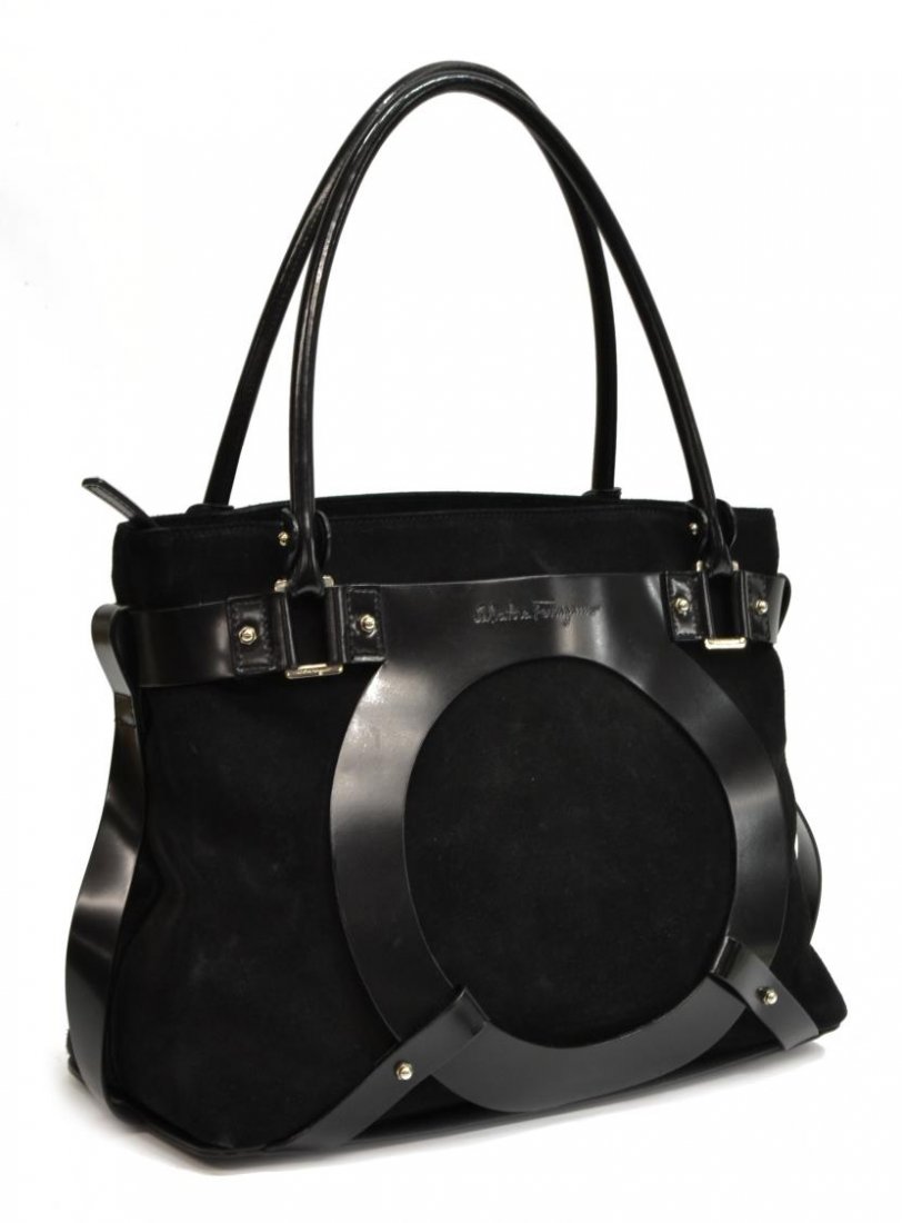 SALVATORE FERRAGAMO BLACK SUEDE & LEATHER BAG: Salvatore Ferragamo handbag in black suede, having smooth leather handles, trim, and piping, silver tone hardware, duel handles, having circular leather cage to front and back, the zipper top opening