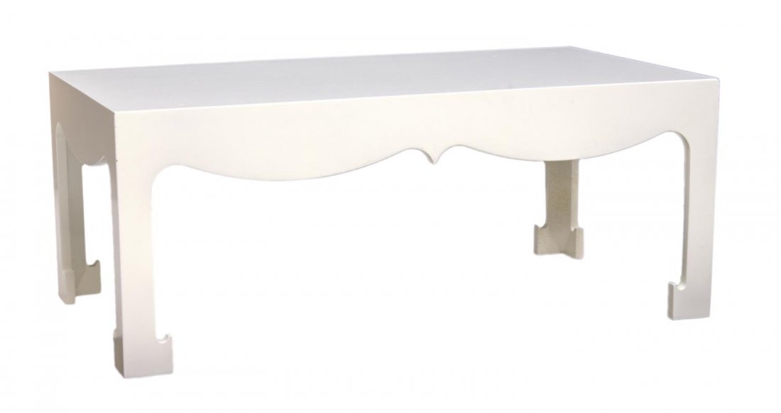 WHITE LACQUERED COFFEE TABLE: White lacquered coffee table, 20th c., the rectangular top over a shaped skirt, all rising on straight hoof foot supports, 16"h, 40"w, 22"d Start Price: $60.00