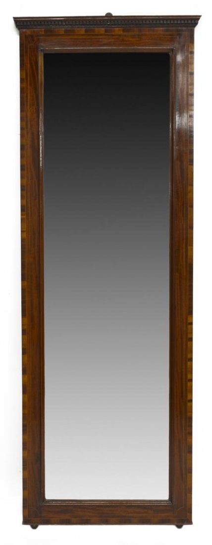 MAHOGANY INLAID FRAMED WALL MIRROR: Mahogany framed wall mirror, 20th c., the string inlay accented frame with a stepped cornice over dentil molding, 70"h, 25.25"w Start Price: $80.00