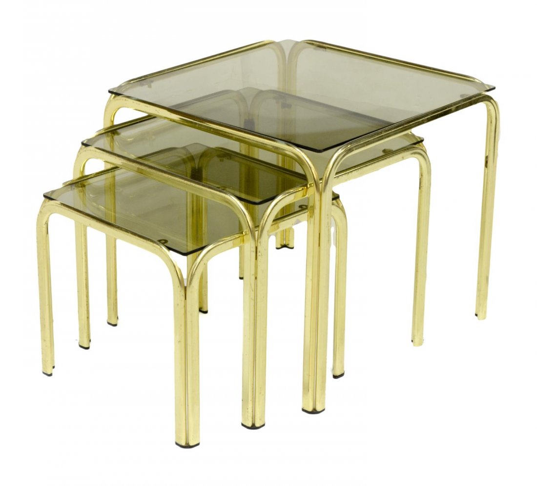 (3) ITALIAN MID-CENTURY MODERN NEST OF TABLES: (lot of 3) Italian mid-century modern nesting tables, gilt metal frame with tinted glass tops, tallest: 15.75"h, 17.75"l, 17.75"w Start Price: $80.00