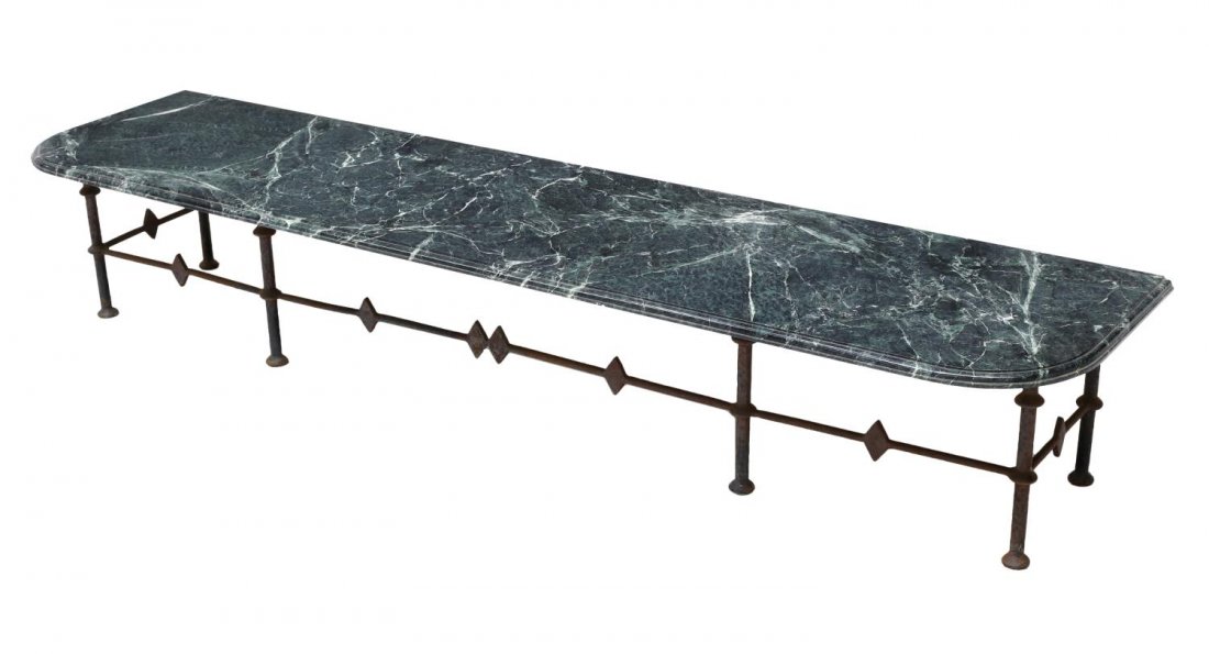 GREEN VARIEGATED MARBLE & IRON OCCASIONAL TABLE: Variegated green "Taiwan" marble top occasional table or bench, the top having two rounded corners and one rough edge over patinated iron base with joined supports, 12"h, 80"w, 18.5"d Start Price: $10