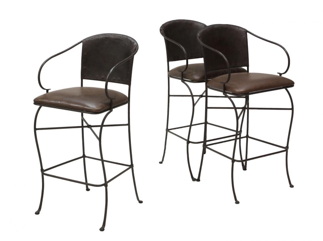(3) WIRE FRAME BARSTOOLS: (lot of 3) Barstools, each a wire frame, curved steel backs over the brown vinyl cushions, the supports joined by a lower foot rest, 41"h, 18.5"w, 20"d *Provenance: From the estate of Jo Anne Christia
