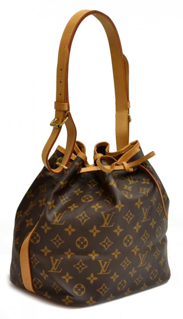 LOUIS VUITTON 'NOE PM' MONOGRAM CANVAS BUCKET BAG: Louis Vuitton "Noe PM" bucket shoulder bag in monogram canvas, having a leather adjustable strap, trim, and piping, the drawstring top opening to brown canvas lined interior, minor patination and crea