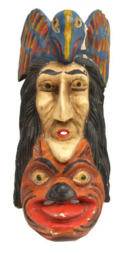 VINTAGE MEXICO CARVED WOOD FOLK MASK: Large vintage carved wood folk mask, State of Guerrero, Mexico, late 20th c., vertical depiction of bird, human face and tiger, plaster on wooden base with polychrome finish, paint loss on the nose an