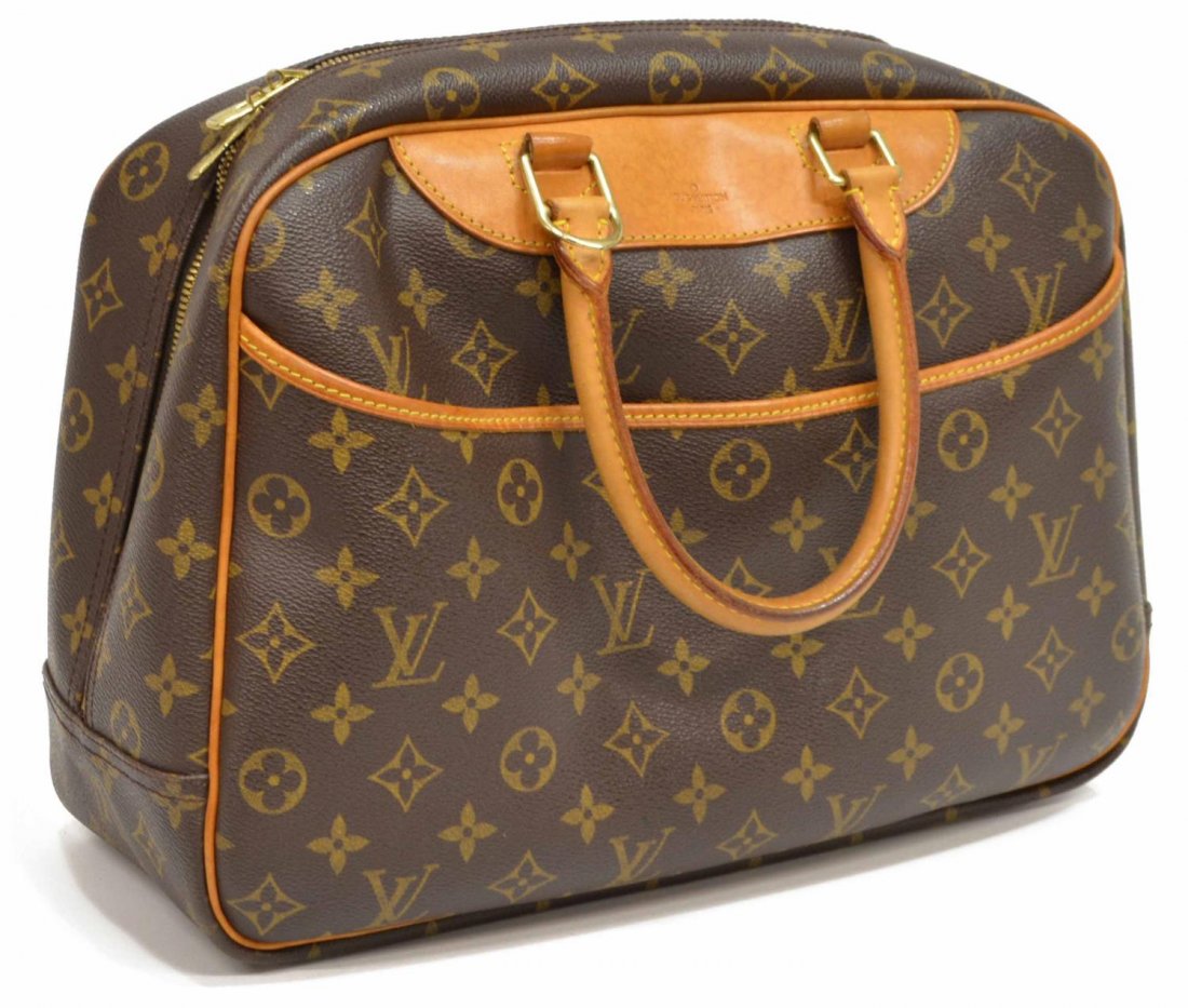 LOUIS VUITTON 'DEAUVILLE' MONOGRAM CANVAS HANDBAG: Louis Vuitton "Deauville" handbag in monogram canvas, leather handles, piping and trim, full length exterior slip pocket, dual zip opening to canvas lined interior with four slot pockets and four elas