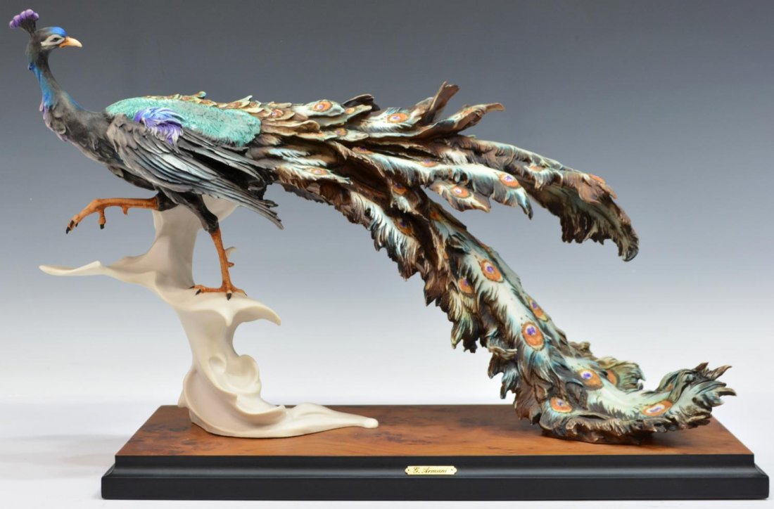 LIMITED EDITION, G. ARMANI, PORCELAIN PEACOCK: Italian limited edition porcelain peacock figure, signed Giuseppe Armani (1935 - 2006), numbered 1493 of 5000, rising on a wooden base, markers mark on verso, approx: 12.75"h, 19.5"w, 7.25"d, 11.25lbs
