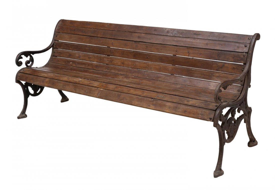 CAST IRON FRAMED TEAKWOOD PARK BENCH, C. 1900: Anglo Indian park bench, c. 1900, the English cast iron sides framing teakwood slats, 30.5"h, 76"w, 26"d Start Price: $200.00