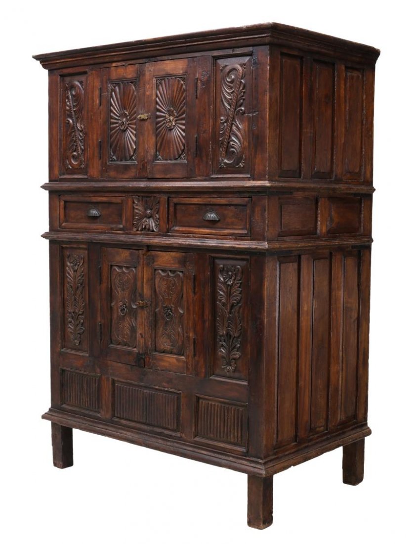 PORTUGUESE COLONIAL STYLE SUNBURST CARVED CABINET: Portuguese Colonial style cabinet, relief carved with sunburst, foliate and decorative patterns, the upright case with cabinet doors and aligned drawers Start Price: $250.00