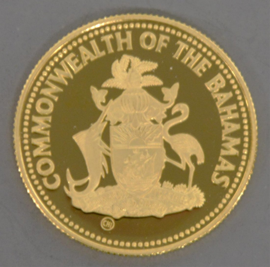 BAHAMAS, 1985 PROOF $100 GOLD COIN: Bahamas 1985 One Hundred Dollar gold coin, .900 gold, 100 grains, housed in presentation box. .75"h, 3.75"w, 3.25"d Start Price: $175.00