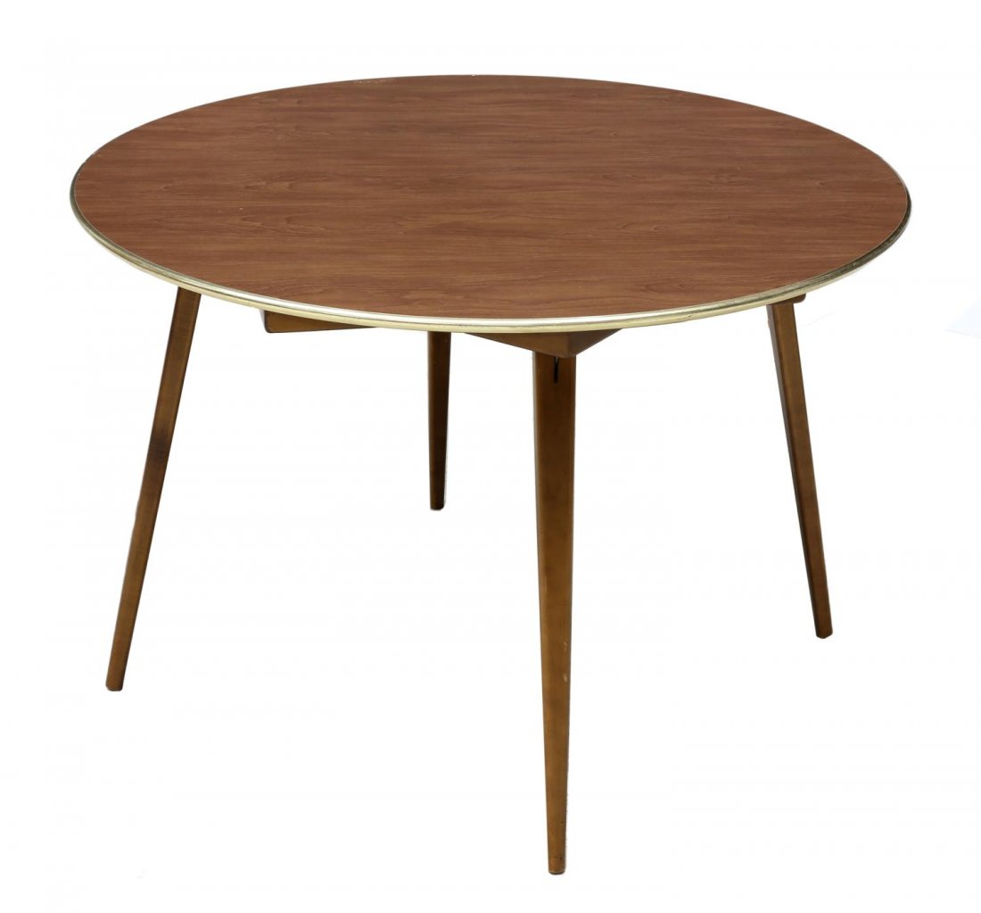 STAKMORE MID-CENTURY FOLDING COFFEE DINING TABLE: American mid-century modern folding coffee / dining table, Stakmore (attributed), circular form with gilt metal edge, rising on two sets of collapsible tapered legs, varying in length, both ending in 