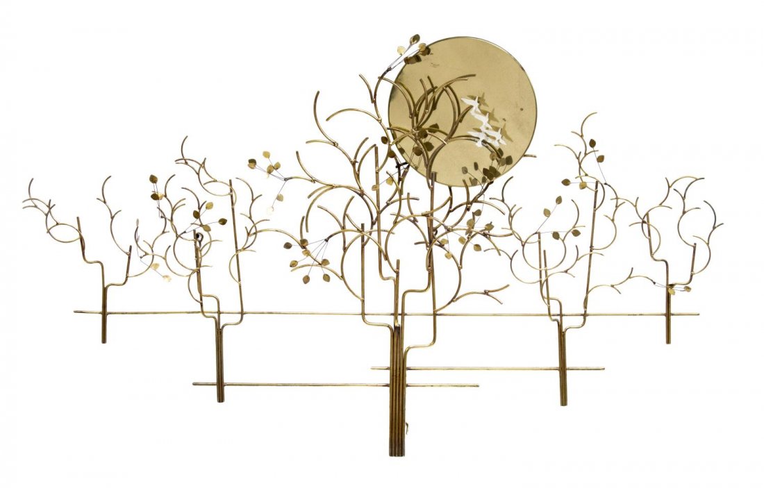 MID-CENTURY MODERN BRASS WALL SCULPTURE, 52"W C. JERE: Mid-century modern brass wall sculpture in the manner of Curtis Jere, c. 1960's, a open design with trees, leaves, white painted flying birds, and a brass disc representing the sun, 32"h, 52"w, 6"d St