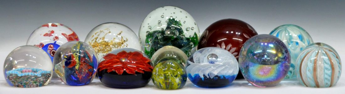 (13)ART GLASS PAPERWEIGHTS, (1) KB ITALY LATTICINO: (lot of 13) Collection of art glass paperweights, various size and shapes, (1) KB Italy having latticino and flecked gold canes, others with flowers, suspended bubbles, canes, gilt flecking, etc., som
