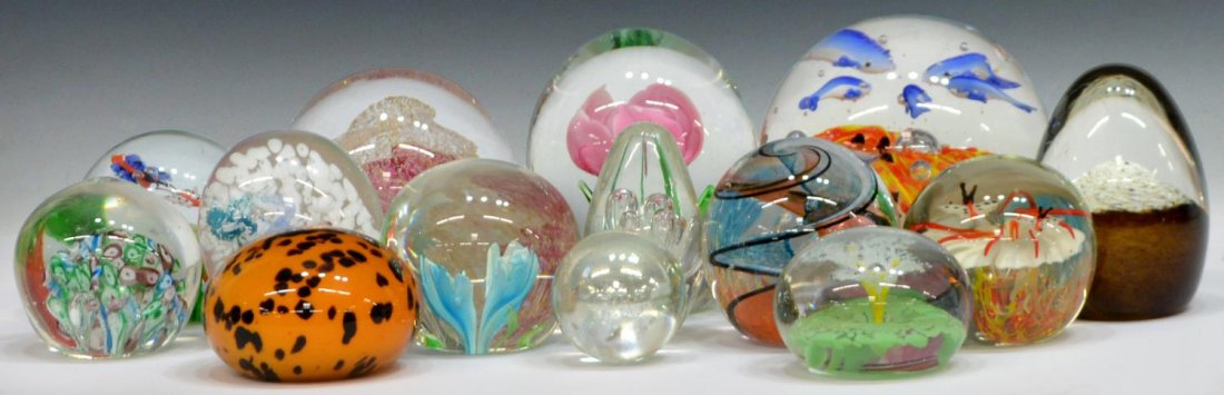 (14) COLLECTION OF ART GLASS PAPERWEIGHTS: (lot of 14) Art glass paperweights, varied shapes and size, examples with fish, flowers, suspended bubbles, canes and butterflies, largest: approx 4.5"h, 19.5lbs total Start Price: $150.00