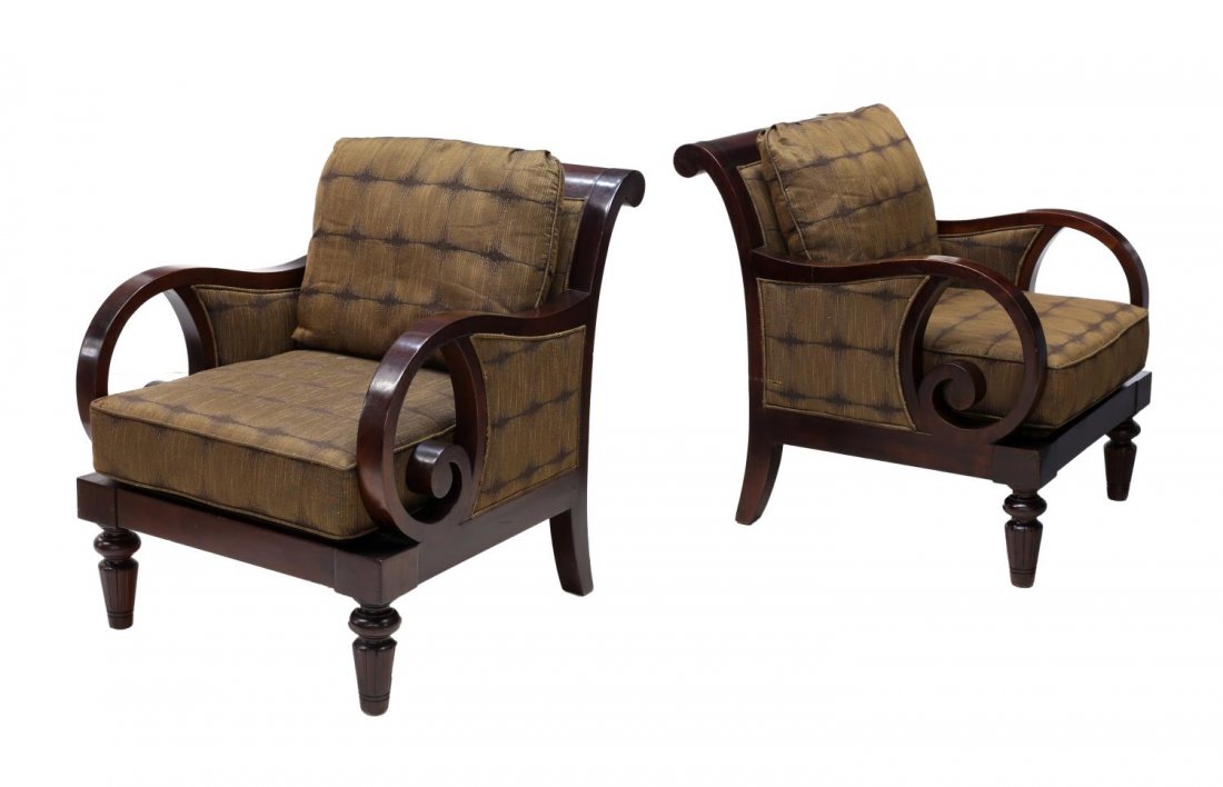 (2) MAHOGANY FRAMED SCROLLED ARM CHAIRS: (lot of 2) Mahoganyn framed arm chairs, late 20th c., having a rolled back, arms terminating in large open scrolls, brown gold accented upholstery with removable seat cushion, rising on turned support
